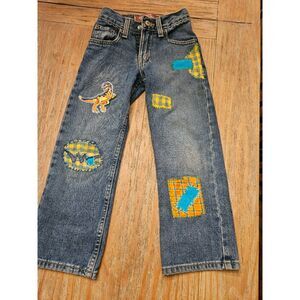 Calling all dinosaur loving children!  Size 6 upcyled patch jeans
